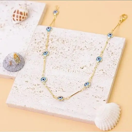 RMZ GOLD NYC 18K GOLD PLATED BAR STYLE LIGHT BLUE EVIL EYE CRYSTAL ANKLET