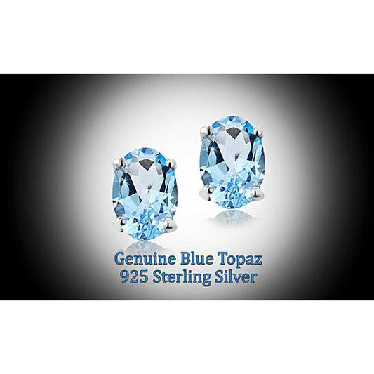 WHITE GOLD GENUINE LONDON BLUE TOPAZ 5X7 OVAL STUD EARRINGS